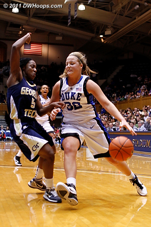 Tricia Liston drives on Metra Walthour  - Duke Tags: #32 Tricia Liston 