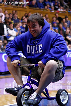 The guy with shorter legs won the trike race  - Duke Tags: Fans 