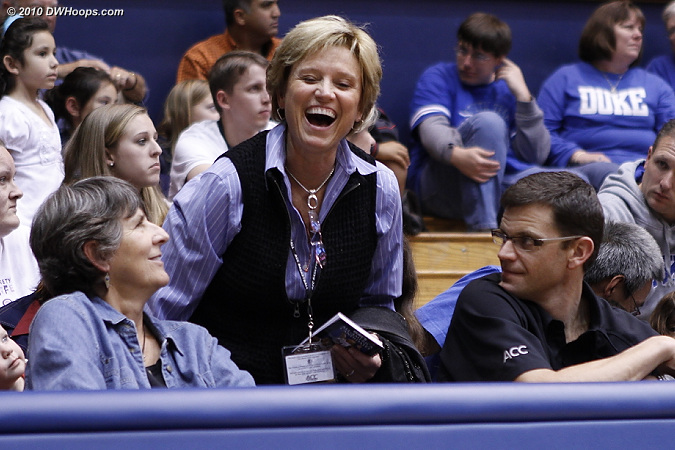 ACC Associate Commissioner Nora Lynn Finch (center) shares a moment with Duke Associate AD Jackie Silar and ACC Director of WBB Operations Brad Hecker.  