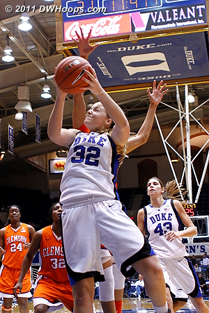 Tricia Liston goes strong to the hoop, a score plus the foul from Chancie Dunn.  - Duke Tags: #32 Tricia Liston 