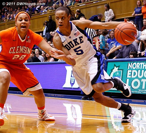 Jasmine Thomas drives by Sthefany Thomas on her way to scoring Duke's first hoop of the night.  - Duke Tags: #5 Jasmine Thomas 