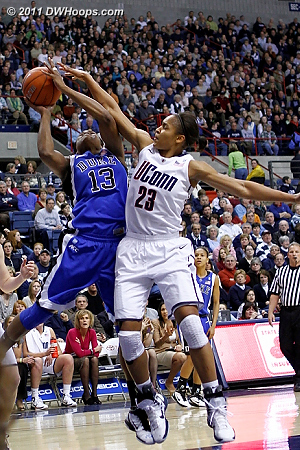 Maya Moore and Karima Christmas tangle in the paint.  - Duke Tags: #13 Karima Christmas 