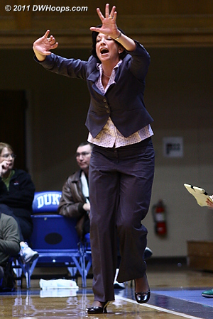 Miami Head Coach Katie Meier calls for Defense #5.  
