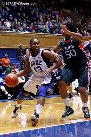 Karima drives on Maria Brown  - Duke Tags: #13 Karima Christmas 