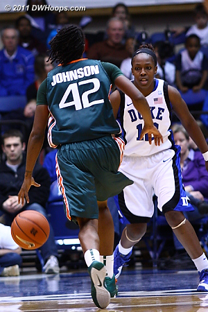 Chelsea Gray gets in position as Shenise Johnson drives  - Duke Tags: #12 Chelsea Gray 