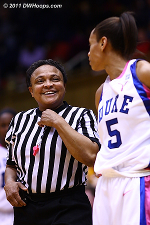 Referee Bonita Spence with a word for Jasmine Thomas during a stoppage in play  