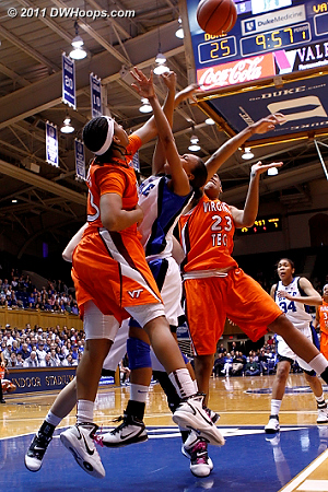 Shanel Harrison fouls Chloe Wells in the paint  - Duke Tags: #4 Chloe Wells 