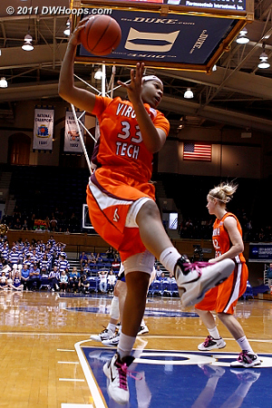 Shanel Harrison pulls down a defensive rebound  