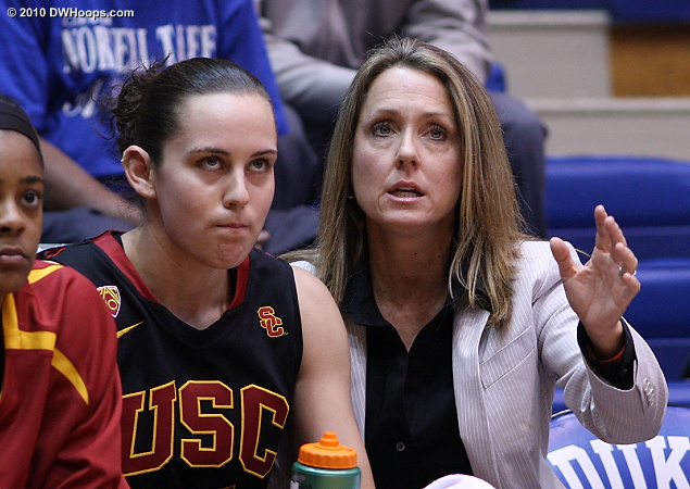 USC assistant Laura Beeman counsels Jacki Gemelos after her second quick foul.  