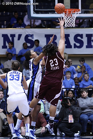 Adams forced her way between Peters and K.Thomas for the layup.  