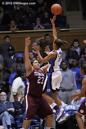Jasmine Thomas elevates as Danielle Adams readies herself for contact.  - Duke Tags: #5 Jasmine Thomas 