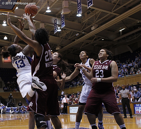 Karima Christmas is fouled by the partially obscured Maryann Baker.  - Duke Tags: #13 Karima Christmas 
