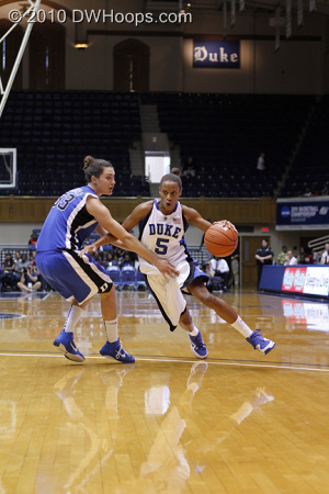 Jasmine Thomas drives around Haley Peters.