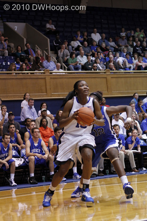 Richa goes up for what looks like the open hoop...
