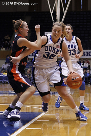 Liston fends off a defender while driving