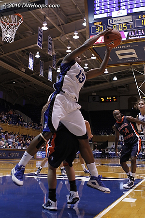 Karima grabs a board  - Duke Tags: #13 Karima Christmas 