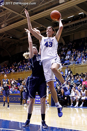 Alison Vernerey drives past Chelsea Mcgowen to score another layup