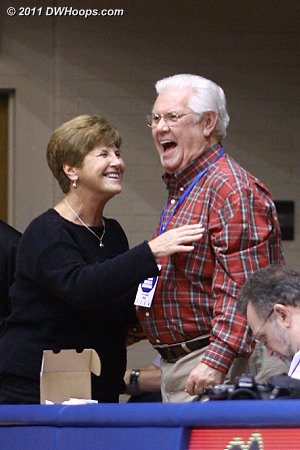 Duke legends Debbie Leonard and Bob Harris share a laugh before the game  