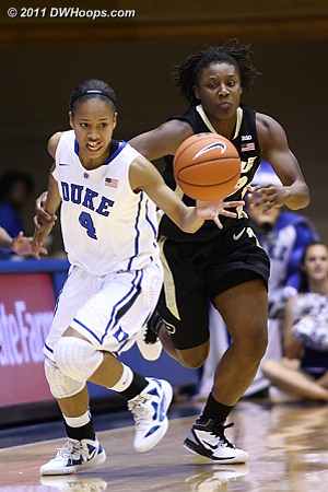 Chloe Wells gets her right arm grabbed by Chantel Poston after knocking the ball away