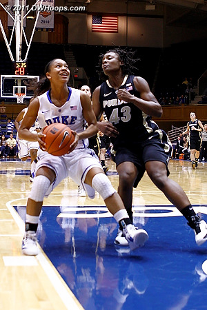On the other end, Wells eyes the basket as Poston (43) looms