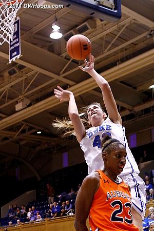 Allison Vernerey finishes in transition as Chantel Hilliard (23) doesn't foul.