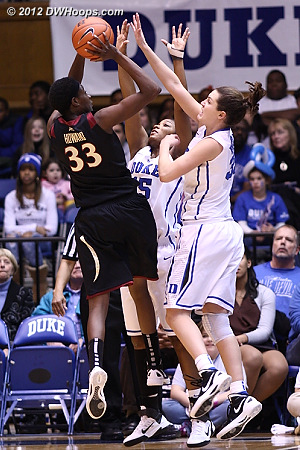 Jackson and Peters confound a Howard jumper  - Duke Tags: #15 Richa Jackson, #33 Haley Peters 