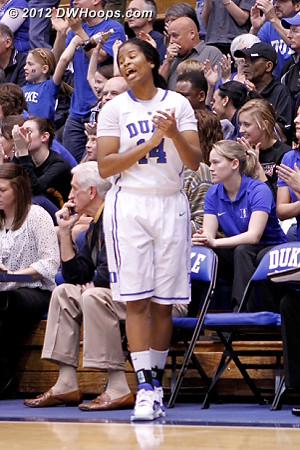 Ka'lia supporting from the bench with a fun dance