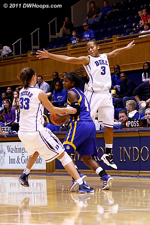 Peters and Selby trap Ciara Lyons (4) resulting in a Bearcat turnover  