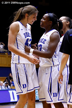 After time was called, Chelsea Gray comes off the bench to congratulate Allison Vernerey on a fine play