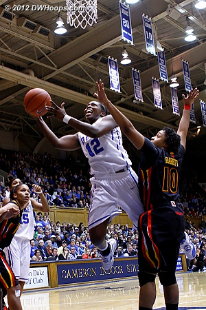 Chelsea Gray attacks the basket during her first half scoring spurt