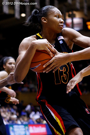 Maryland's Alicia DeVaughn cradles a rebound  