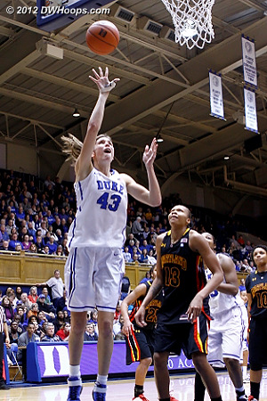 ...Vernerey took the pass from Peters and scored easily. 63-57 Duke