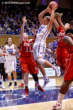 Tricia Liston grabs an offensive rebound