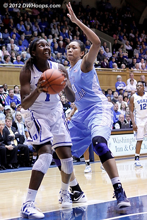 Williams got position and drew Shegog's first foul  - Duke Tags: #1 Elizabeth Williams - UNC Players: #20 Chay Shegog 
