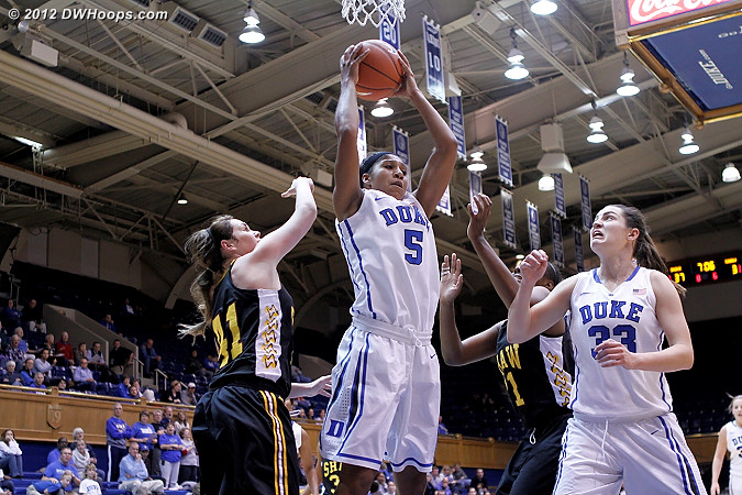 Moore grabs a rebound  - Duke Tags: #5 Sierra Moore, #33 Haley Peters 