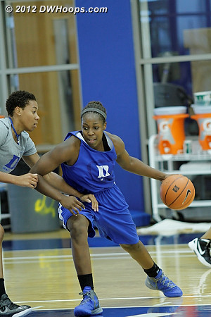 Chelsea Gray battles assistant coach Joy Cheek during a drill  - Duke Tags: #12 Chelsea Gray, Joy Cheek  