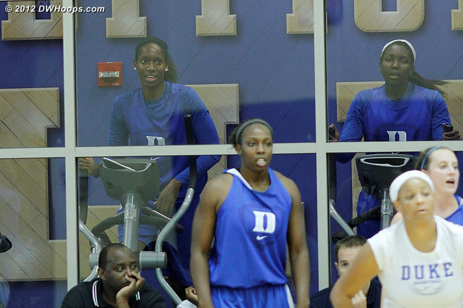 Amber Henson (left) and Elizabeth Williams (right) were unable to practice due to injury - they instead worked out while they watched  - Duke Tags: #1 Elizabeth Williams , #30 Amber Henson 