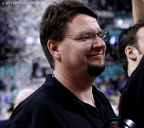 Photographer Mark Dolejs watches the scene unfold  