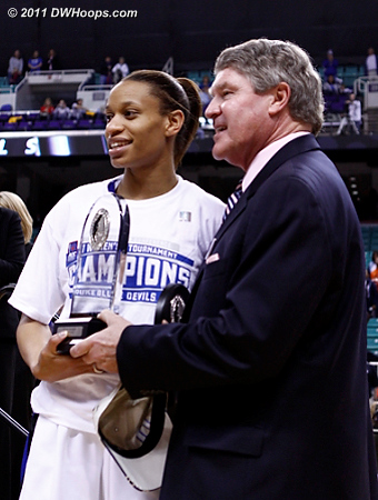 Jasmine Thomas receives the MVP award from ACC Commissioner John Swofford  - Duke Tags: #5 Jasmine Thomas 