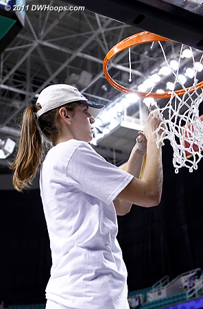 Alli cuts her piece of the net  - Duke Tags: #43 Allison Vernerey 