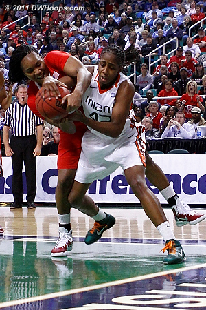 DWHoops Photo  - NCSU Players: #44 Kody Burke - MIA Tags: #42 Shenise Johnson 