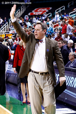 State assistant Richard Barron waves to the crowd  