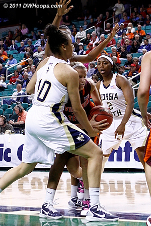Fenyn in the swarm  - VT Players: #13 Alyssa Fenyn - GT Tags: #2 Mo Bennett, #10 Danielle Hamilton-Carter 