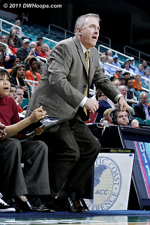 Wake assistant Bob Clark comes flying off the bench after a bad call  