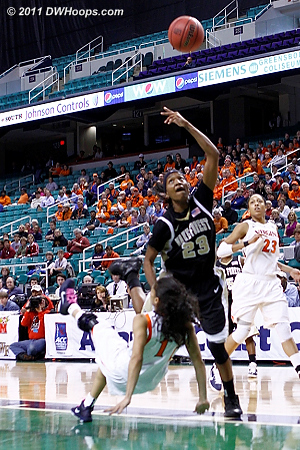 Crosby takes the charge  - UVA Players: #1 China Crosby - WF Tags: #23 Secily Ray 