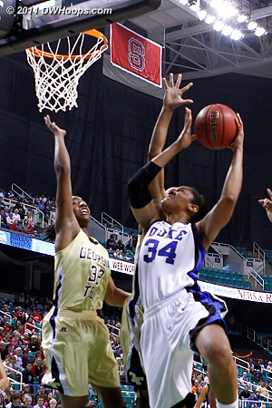 Krystal scores on the break, and one  - Duke Tags: #34 Krystal Thomas - GT Players: #32 Chelsea Regins 