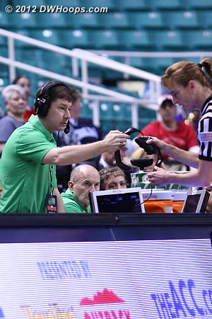 Lindy Brown, a man of many talents, was ready to give Dee Kantner the headphones for a video review of the play.  It was ruled a regular foul because contact was made with the forearm not the elbow.  