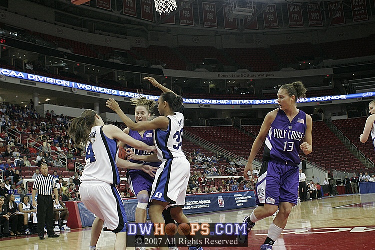 Abby Waner tries for the tieup, but is whistled for the foul
