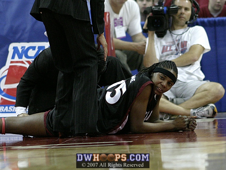 Jasmine Stone with what looked like a leg cramp