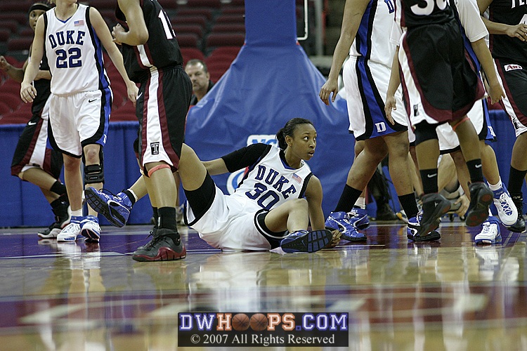 Carrem Gay after taking a charge from Landry